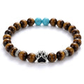 Golden Shore shelter bracelet with paw charm