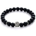 Black Diamond shelter bracelet with paw charm