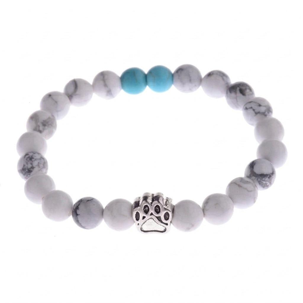 Snowy Oasis shelter bracelet with paw charm